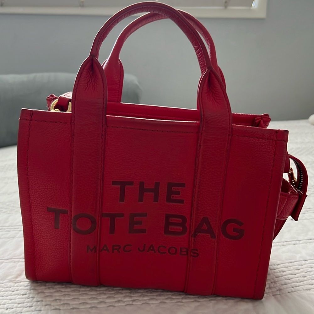 Used, medium size red Marc Jacob’s purse.